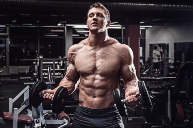 Muscular man with dumbbells