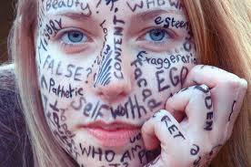 insecure face with writing