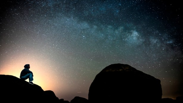 man_looking_up_at_stars_blog_size